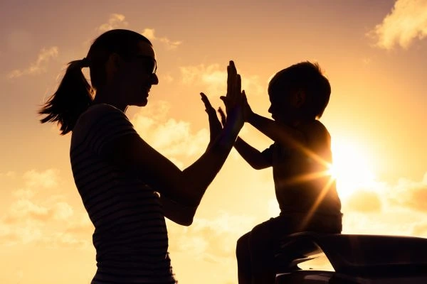 Image of happy mother and child after resolving child arrangements Suffolk